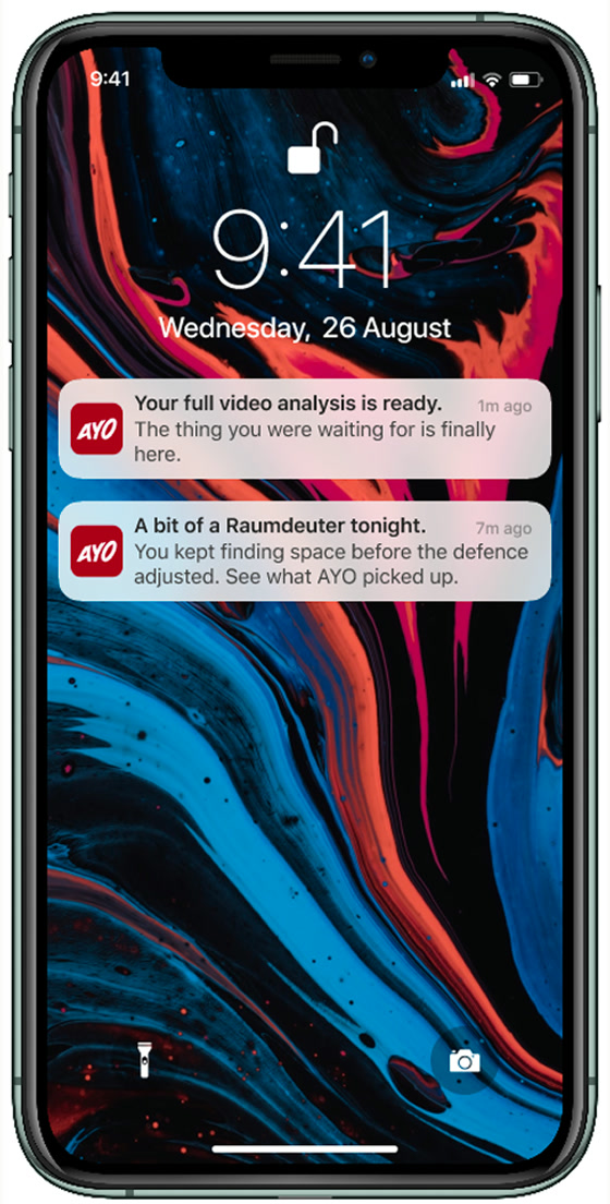 A lockscreen with two Ayo notifications, one saying the video analysis is ready.